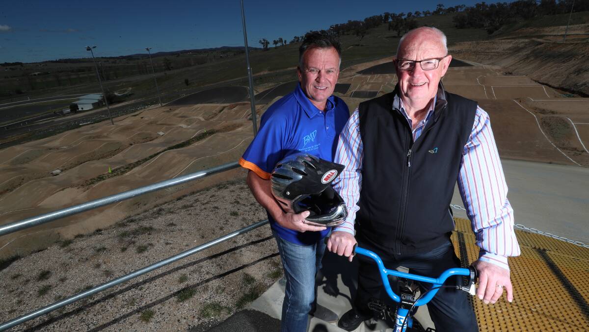 RIDE ON: Bathurst BMX Club president Michael Breen and mayor Graeme Hanger have welcomed news Bathurst will host a World Cup round in 2020. Photo: PHIL BLATCH