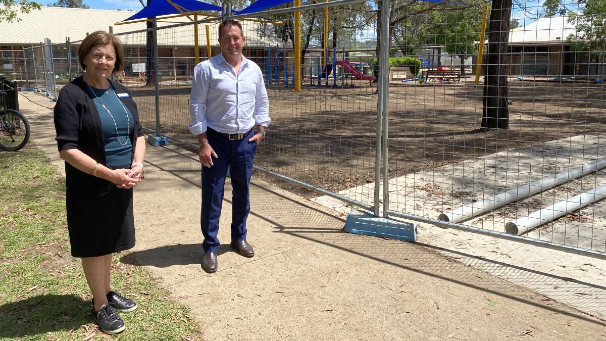 WORK SITE: Eglinton Public School principal Vicki O'Rourke and Bathurst MP Paul Toole next to the playground construction site. Photo: SUPPLIED