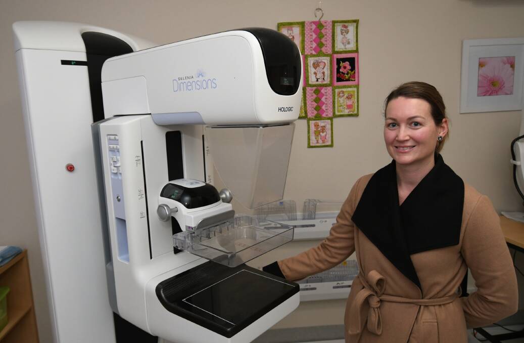 TAKE THE TEST: BreastScreen NSW health promotions officer Kay Smith with a breast screening unit at the Bathurst centre. Photo: CHRIS SEABROOK 081319chekem1