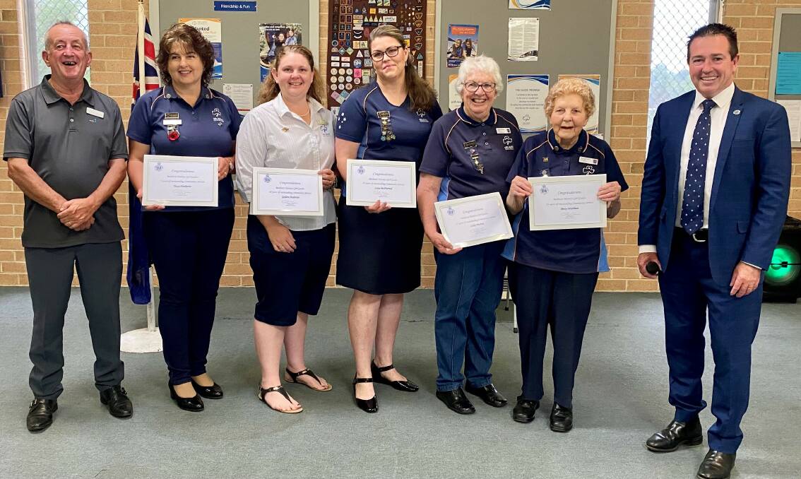 DEDICATION: Mayor Bobby Bourke (left) and Bathurst MP Paul Toole (right) with long-serving Bathurst guides leaders Tracy Nankervis, Gaylene Anderson, Luisa McDiarmid, Lesley Buchan and Betty Wardman. Photo: SUPPLIED
