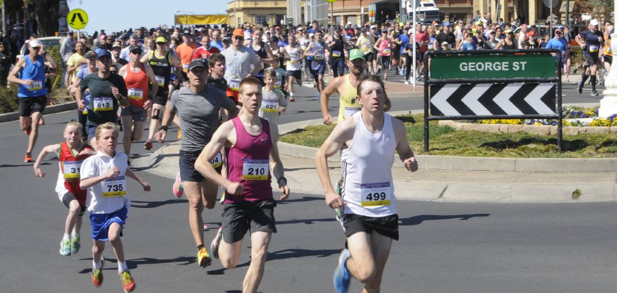 THEY'RE OFF: Participants race down Russell Street at the start of the 2017 Bathurst Edgell Jog. Photo: CHRIS SEABROOK