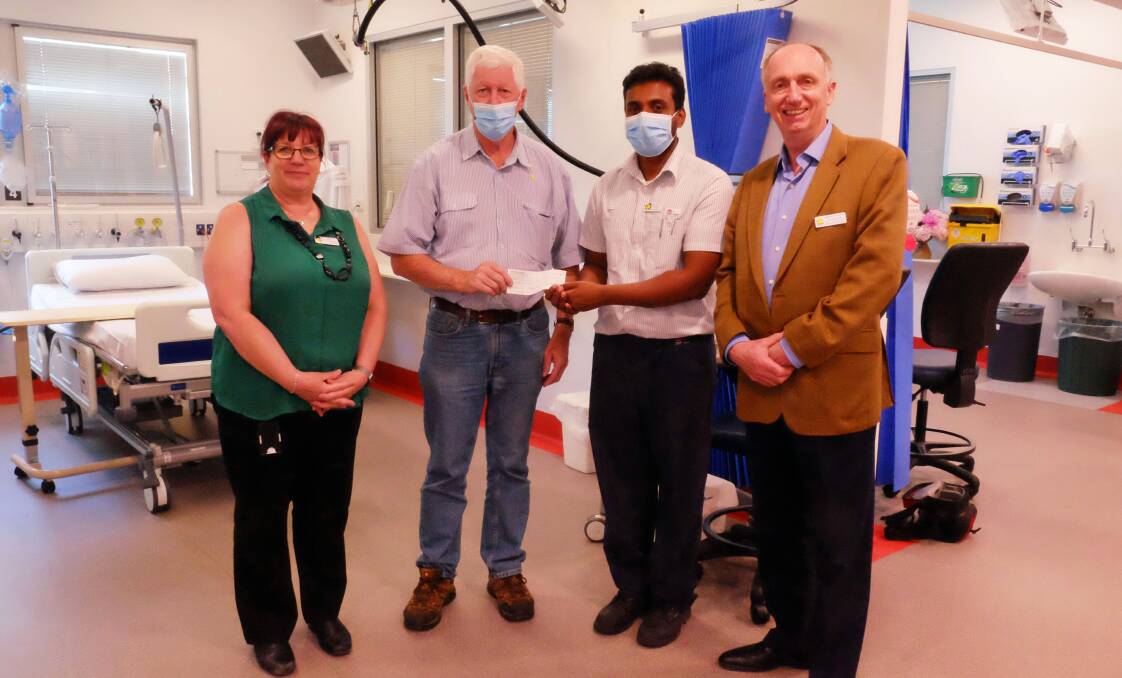 RIDE: Club president Bruce Morgan (second left) with director of nursing Tracy Witich, nursing unit manager Bijay Thomas and medical services director Dr Denis Smith.