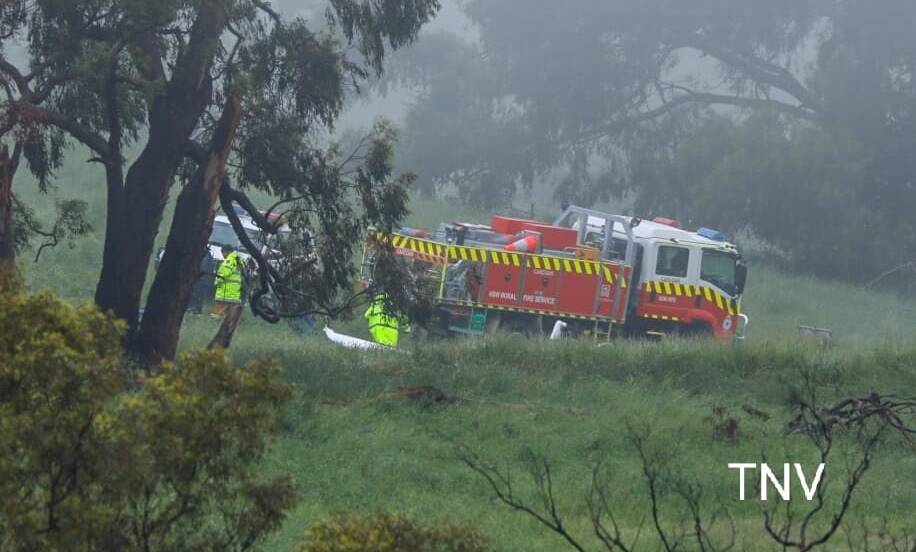 CRASH SITE: Emergency services on the scene of a fatal light plane crash in Carcoar. Photo: TROY PERSON/TNV