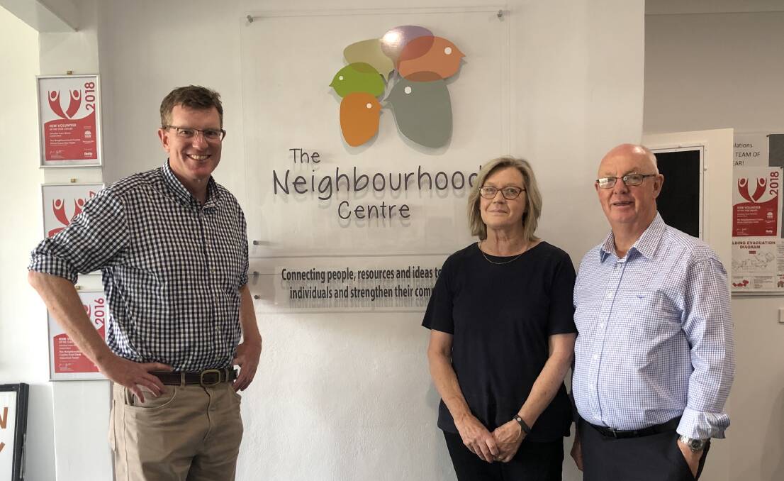 FUNDING SAVED: Calare MP Andrew Gee, The Neighbourhood Centre executive officer Jean Fell and mayor Graeme Hanger celebrate the announcement. Photo: SUPPLIED