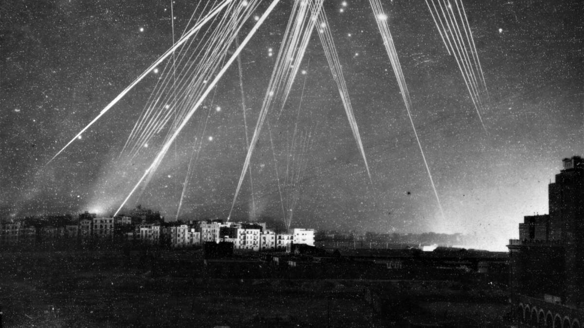 Yesterday, Today | Air raid lights up the night sky over Alexandria