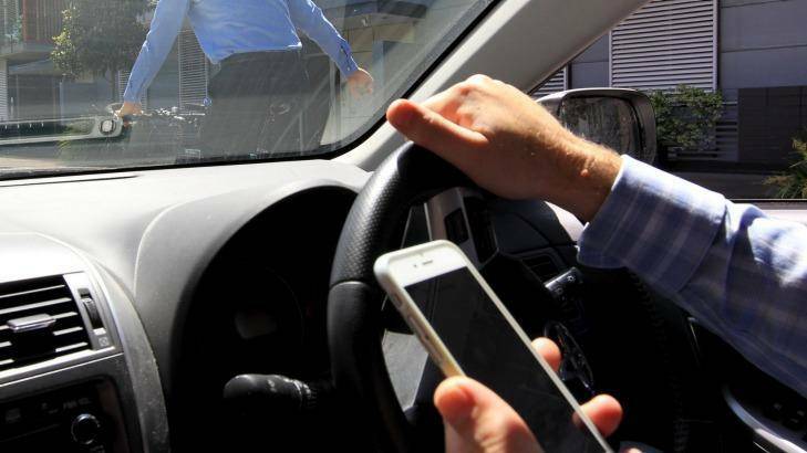 Driven to distraction: Motorists must buckle up and get off the phone