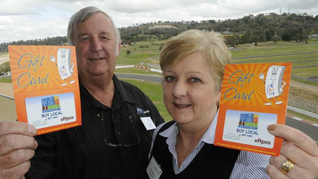 GREAT INITIATIVE: fifty8George owners Terry and Marie Rouland are supporters of the Buy Local Gift Card scheme. Photo: CHRIS SEABROOK 042915cbxcard