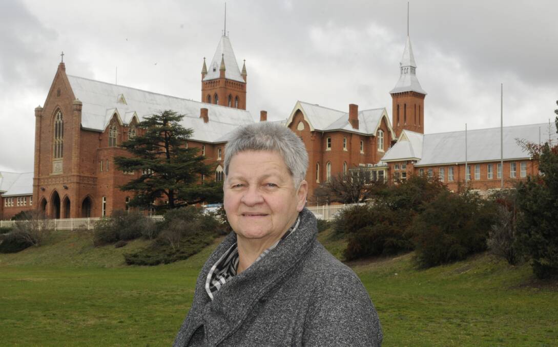 FEELS LIKE HOME: Chris Tobin outside Bathurst's St Stanislaus' College, where she has volunteered for the past 31 years. Photo: CHRIS SEABROOK 070516ctobin3