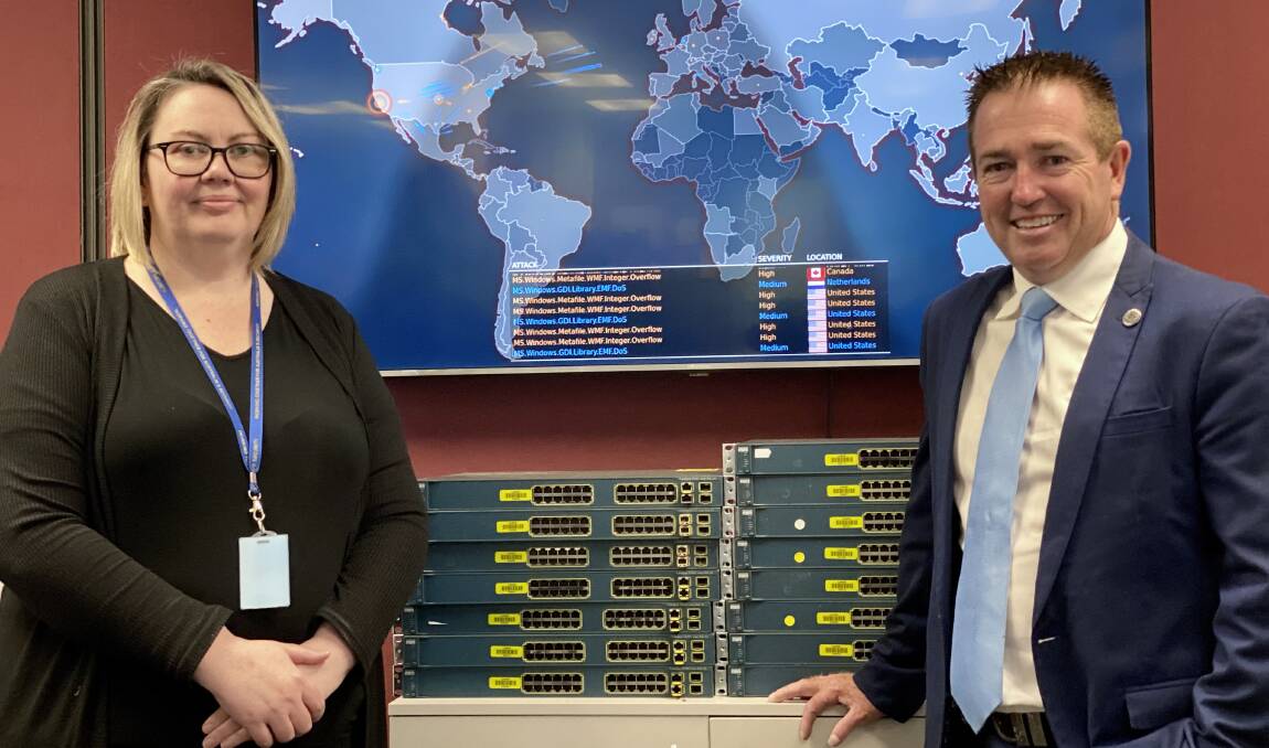 CYBER SAFE: Vulnerability Management Centre manager Natasha Steele with Member for Bathurst Paul Toole.