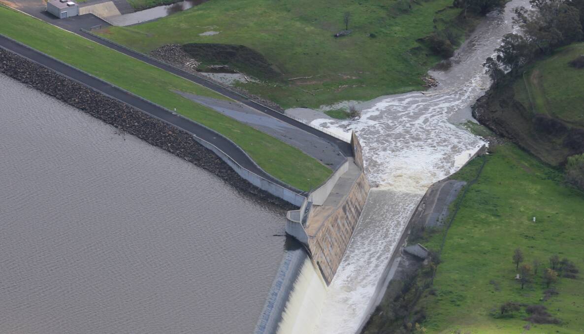 WHAT NEXT: Chifley Dam from the air on September 23, 2016 when the dam reached 100 per cent and started spilling over the spillway. Photo: DAVID CARROLL 100516dam10