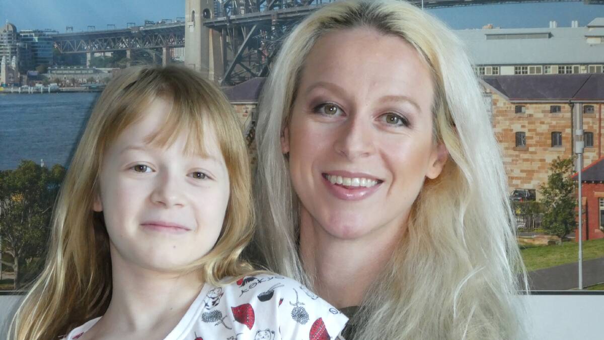 BACK IN AUSTRALIA: Janelle Lindsay and her daughter Victoria, 8, are back in Australia but Ms Lindsay says more needs to be done to help expats return home. Photo: SUPPLIED
