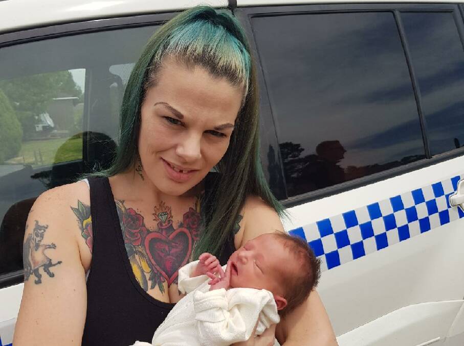 MUM AND BUB: Police officers helped deliver baby Scarlet last Sunday, October 18. Photo: NSW POLICE