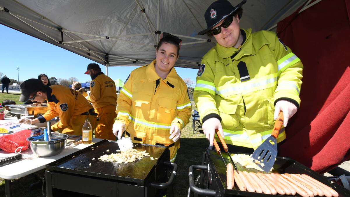 SNAPHOT: Shannon Burridge and Justin Savidge helped out on Raglan RFS barbecue stand at the Bluntside skateboarding day on Sunday. 