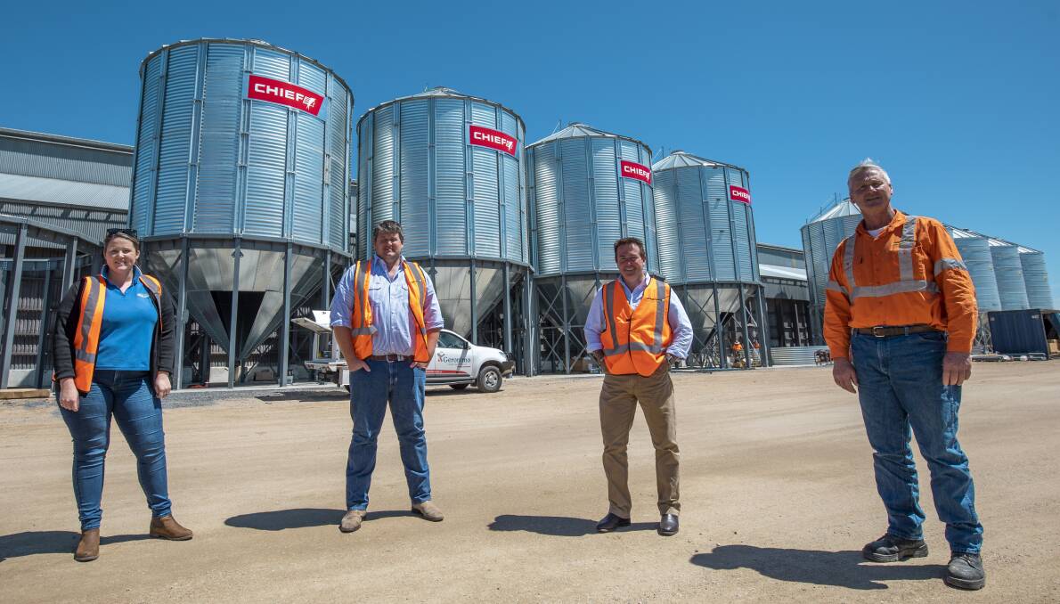 EXTRA STORAGE: Estelle Larnach, left, Wes Larnach, Paul Toole MP and Derek Larnach inspect the new silos at the Kelso terminal. Photo: SUPPLIED