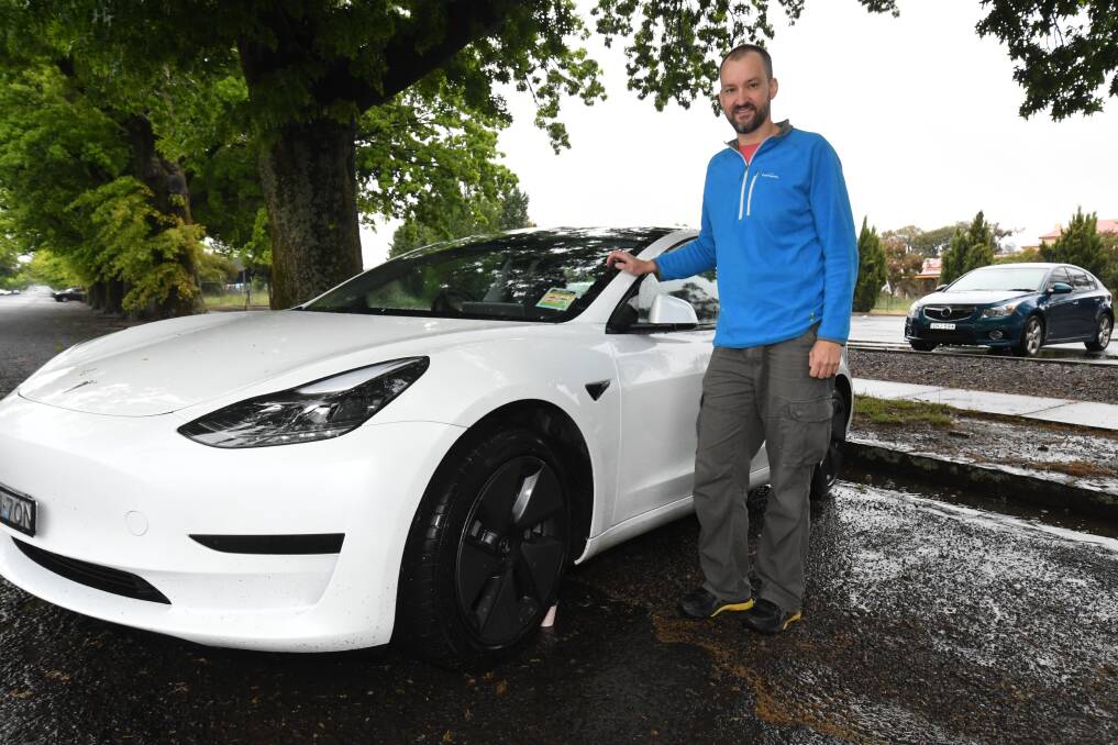 CHARGING AHEAD: Tesla owner Granton Smith says the tide is turning when it comes to electric cars. Photo: JUDE KEOGH