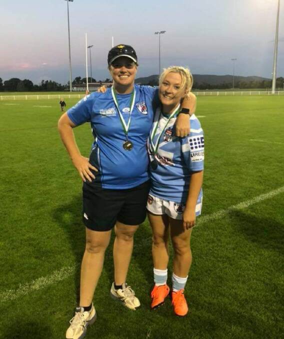 COMRADES IN ARMS: Bathurst police officers Marita Shoulders and Sarah Archer as part of the Group 10 Rugby League side. Both will be playing in the Australian Police rugby union side next week. Photo: SUPPLIED. 