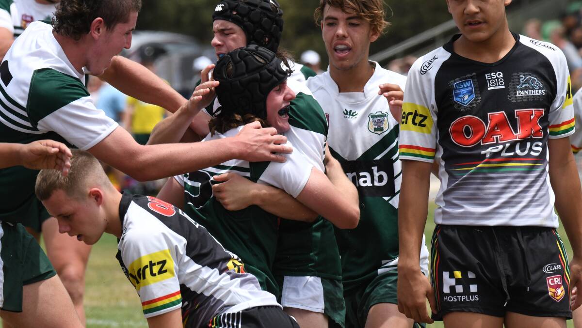 TRY JUBILATION: Dubbo's Will Malloy celebrates getting over the line in Blayney in Saturday's Rams trial game against Penrith Panthers. Photo: JUDE KEOGH
