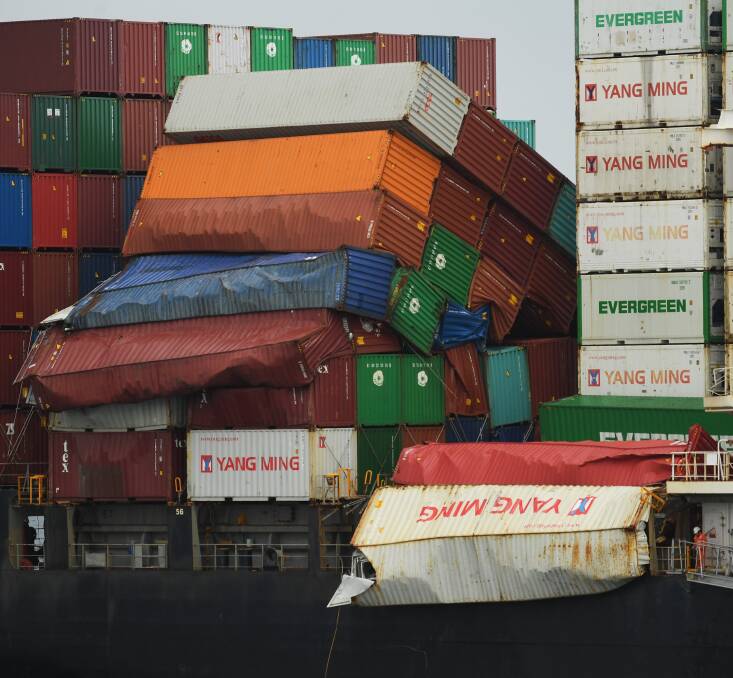 Unstable: A tower of lose containers aboard the Liberian-flagged cargo ship YM Efficiency, which docked in Sydney on Wednesday. 