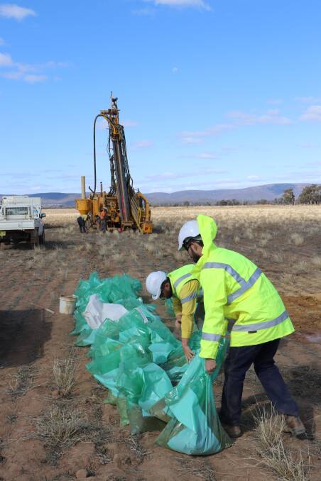 SAMPLES: Alkane Resources workers collect ore samples at the Roswell prospect.