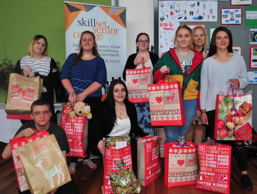 GIFT GIVING: Year 10 students from Skillset Senior College, with the gift bags of donations they collected for homeless people living in Bathurst.
