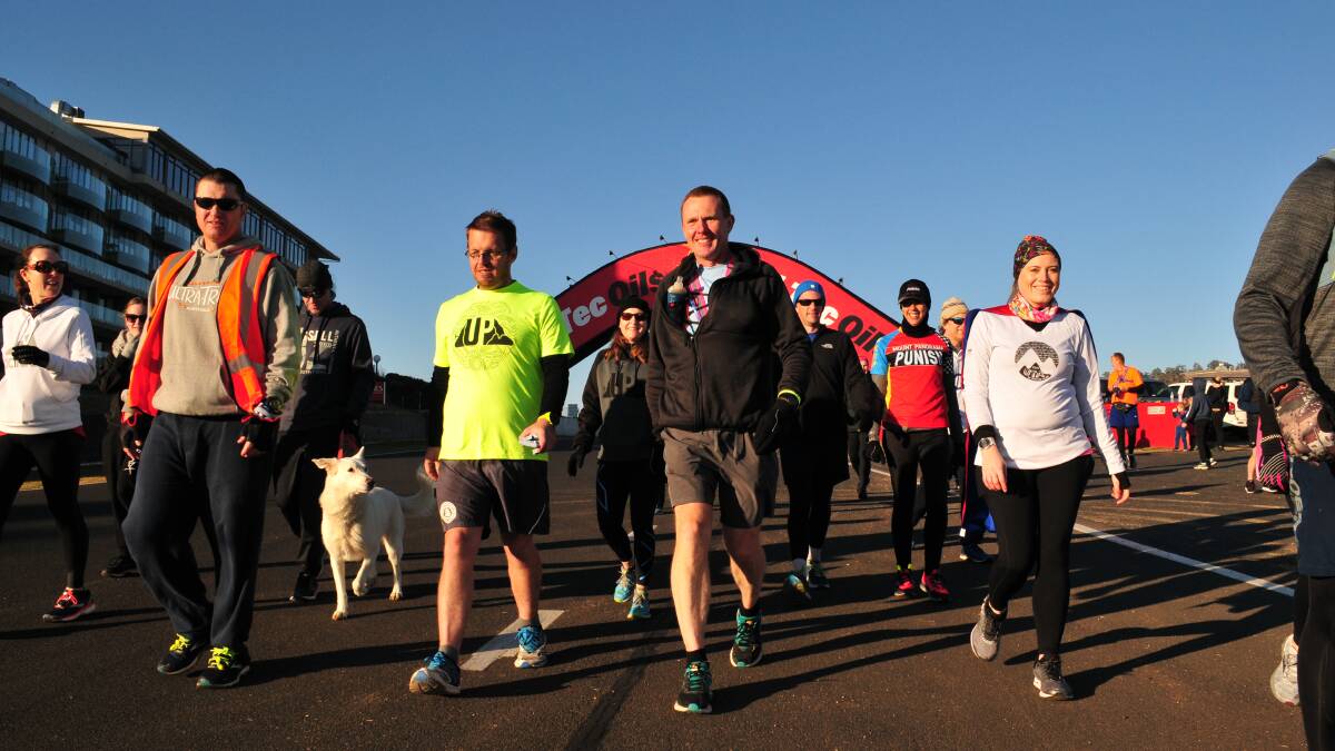 Police officer Phil Mounce-Stephens did 24 hours continually walking and running Mount Panorama over the weekend.