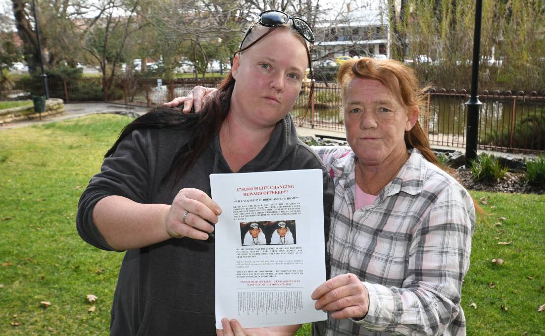PLEASE HELP US: Kiara White, and Sue Wallace holding one of the posters that will be hung around Bathurst this weekend. Photo: CHRIS SEABROOK