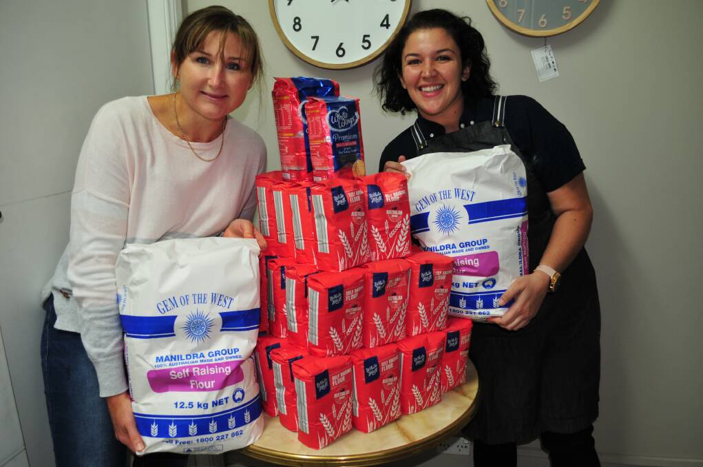SHOUT OUT: Mel Kelly and Loren Gallardo from Bake Table & Tea with just some of the flour given to the shop which couldn't source any due to panic buying.