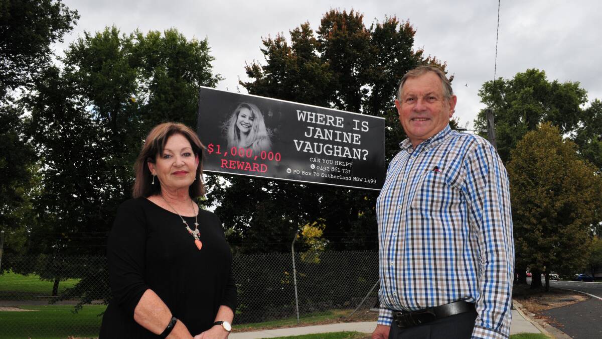 Rhonda Griffin and Peter Rogers, stand near the Janine Vaughan billboard, in the city's CBD. The billboard has been handed back to the community and will now be used to promote community events.