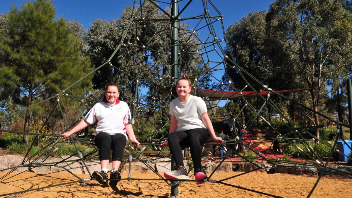 ENJOYING THE OUTING: Georgie Clarke and her friend Maggie Killen, enjoying the Adventure Park playground on Sunday.