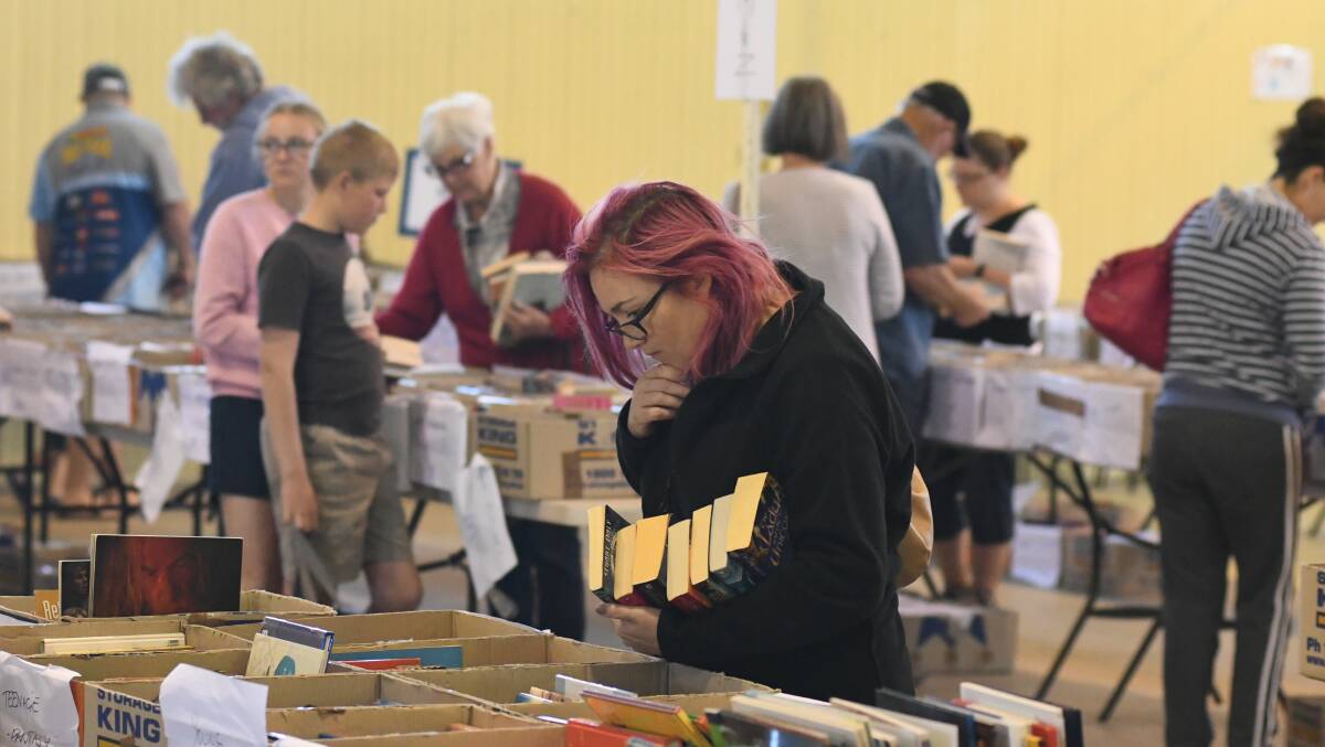 BOOKS GALORE: There was an exceptional range of books to check out, for those at Lifeline's bi-annual two day Book Fair. Photo:CHRIS SEABROOK 102019cbkfair