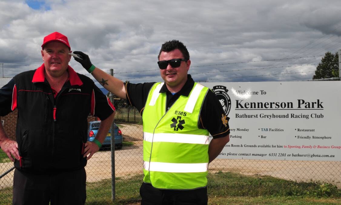 SAFETY FIRST: Track manager, Jason Lyne, has his temperature taken by EMS employee, Lachlan Gardner, before entering Kennerson Park.