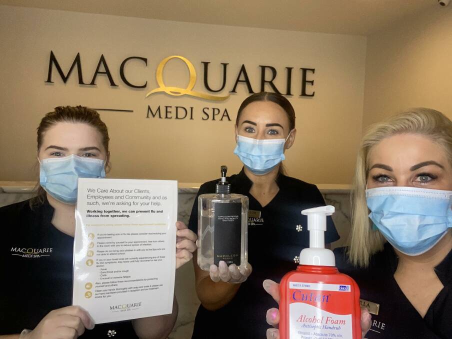 KEEPING IT SAFE: Karla McDiarmid, far right, with her staff, said it's business as usual, with the business increasing it's already already strict hygiene practices. 