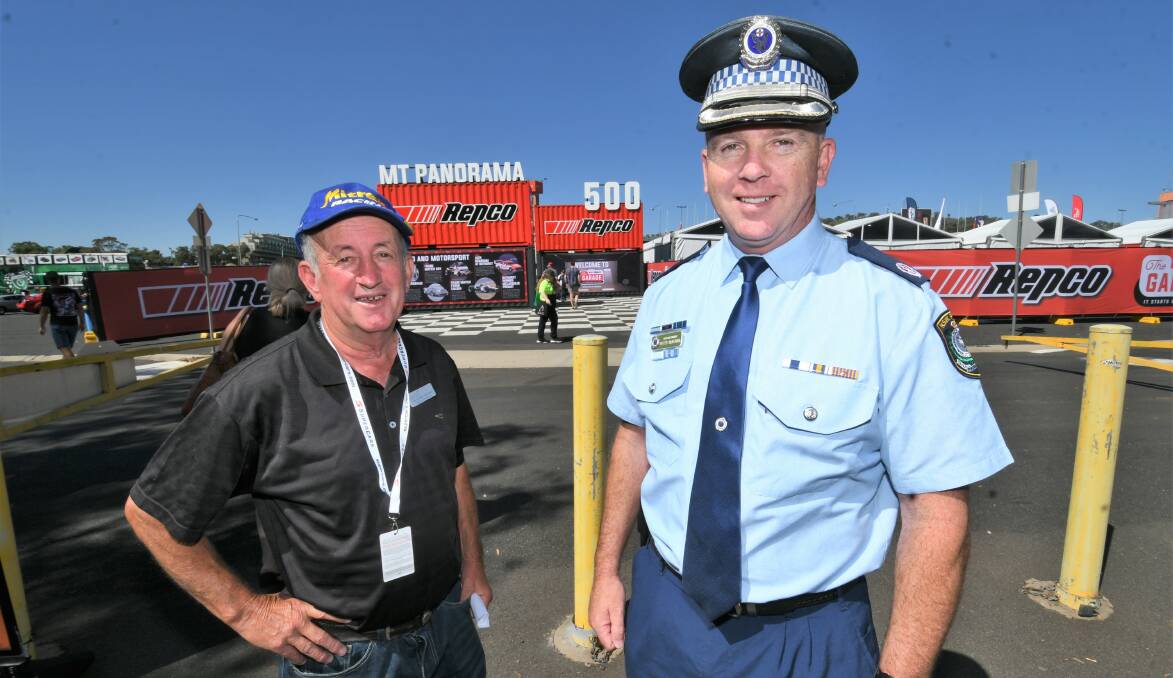 RACING BEGINS: Bathurst mayor Bobby Bourke with Acting Assistant Commissioner Peter McKenna at Mount Panorama on Friday. Photo: CHRIS SEABROOK