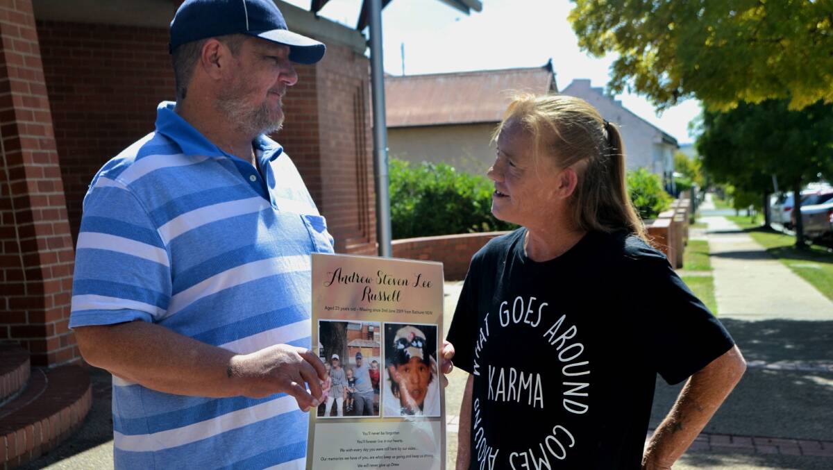 WELCOME NEWS: Bruce Herbert and Sue Wallace, outside Bathurst Police Station, holding a picture of Andrew Russell, last seen in June 2009. The State Government has announced a $750,000 reward. PHOTO: Rachel Chamberlain