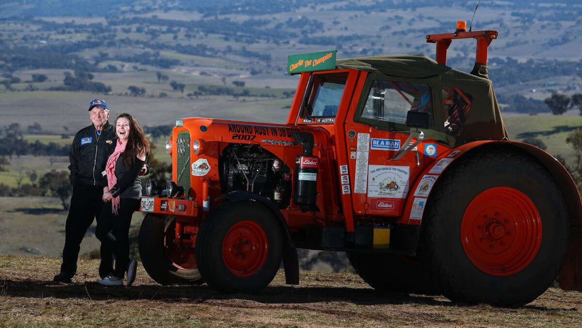 PROMOTING HEALTH: Ron Bywaters and Alicia Horton with the tractor during its brief stopover in Bathurst on Wednesday.