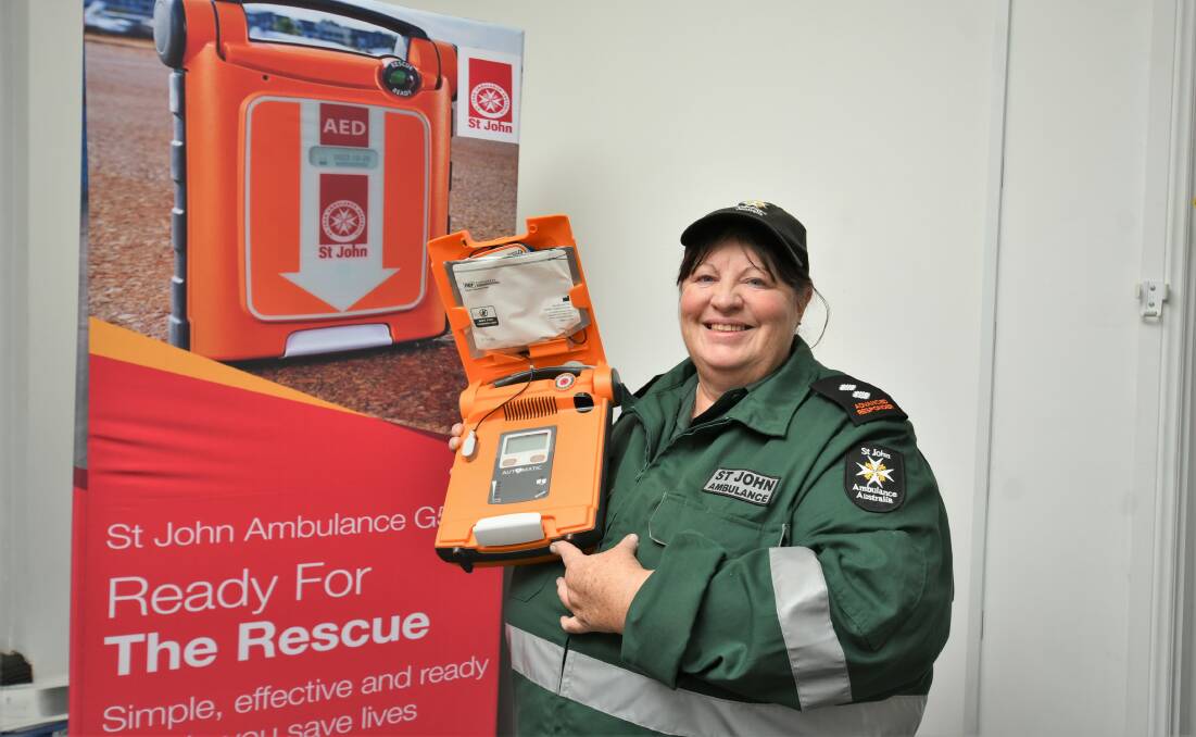 BE READY: St. John Ambulance Officer, Deb Benham with one of the G 5 A.E.D. units. Photo:CHRIS SEABROOK 050321cdefib