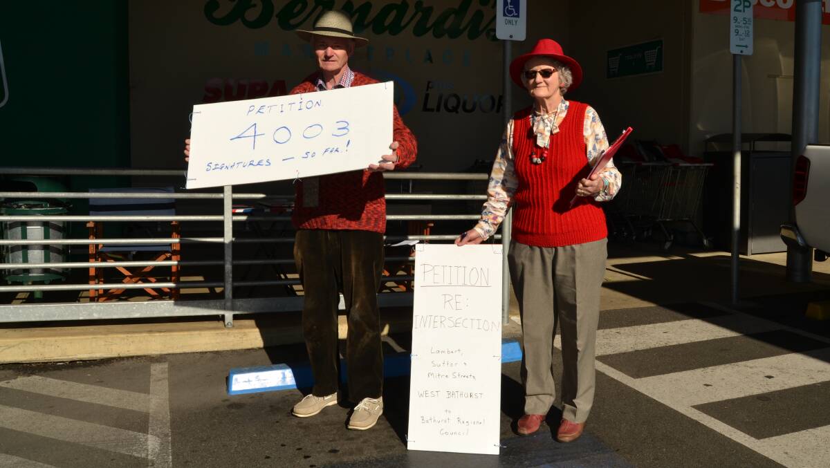4000 SIGNATURES: Kent and Diane McNab collecting signatures at IGA.