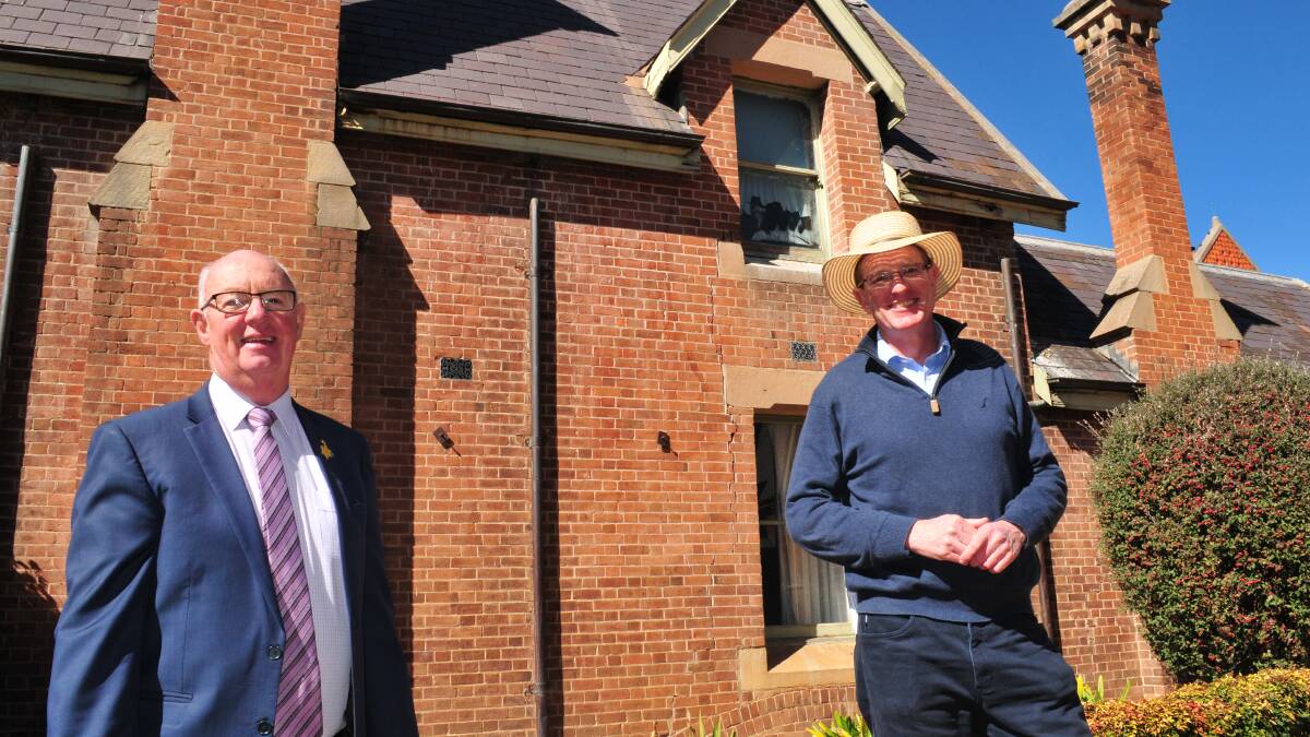 FUNDING NEWS: Mayor of Bathurst, Graeme Hanger, with Member for Calare, Andrew Gee, outside the former Headmaster's Residence in Howick Street, which willbe refurbished through the funding allocation.