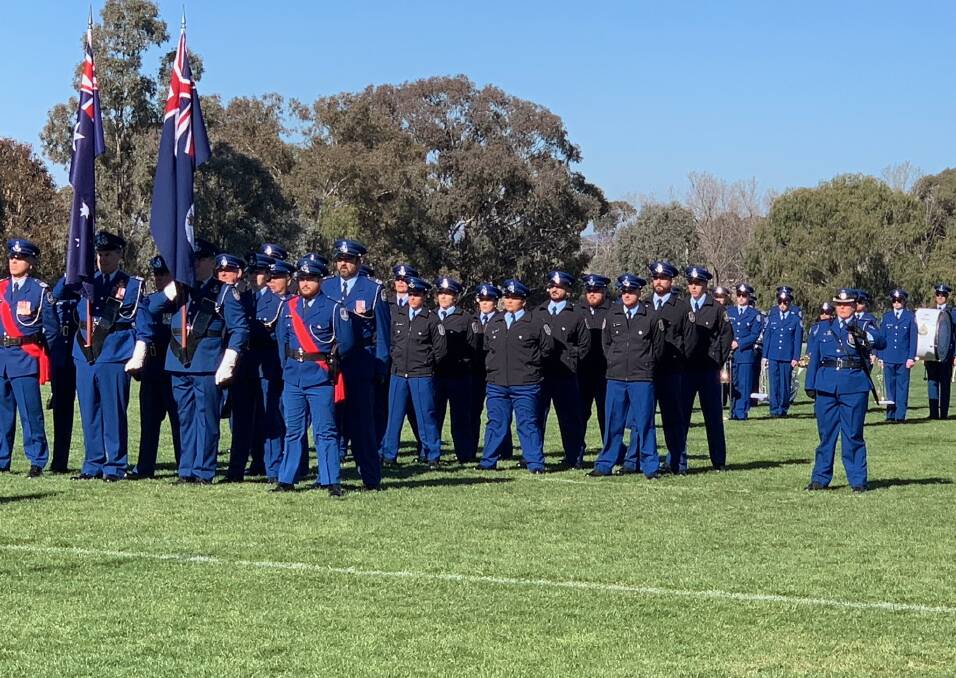 CORRECTIONS: The group of 13 men and eight women were ceremonially sworn in at an attestation parade at Charles Sturt University, Bathurst.
