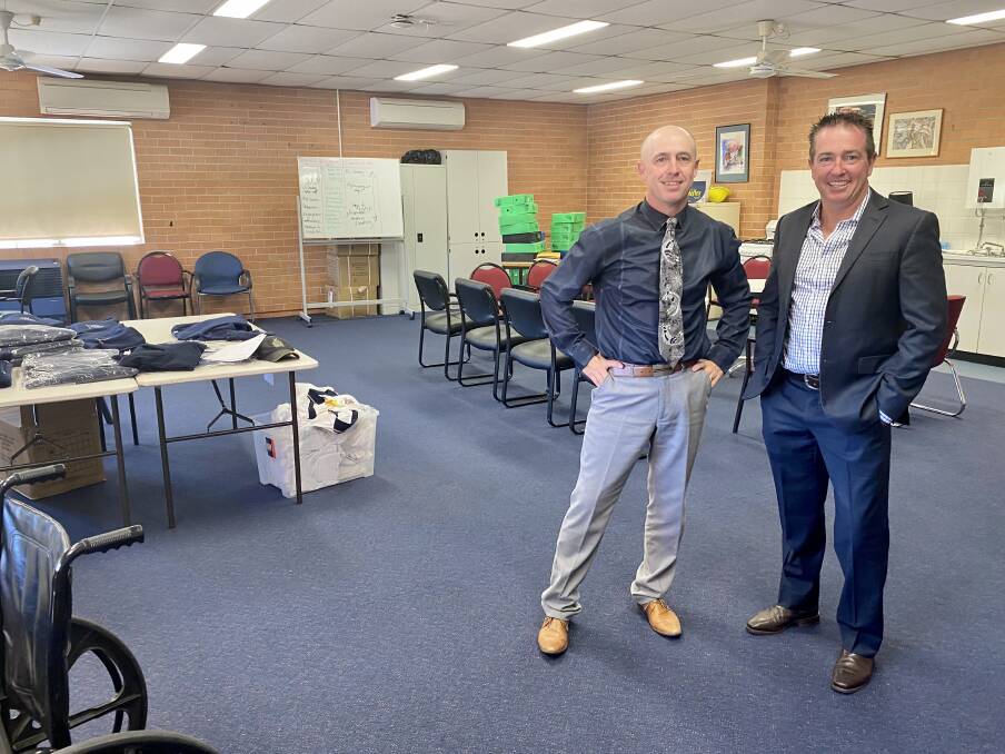 FUNDING SUCCESS: Member for Bathurst Paul Toole, right, with Denison College's Bathurst Campus principal Ken Barwick in the former staff room which is set to be converted into three separate interview rooms.