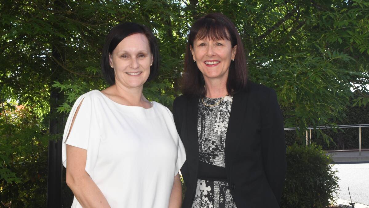 NEW APPOINTMENT: Peta Kingham, left, PA to executive director with newly appointed Executive Director of Catholic Schools Mrs Christina Trimble, at the two-day conference.