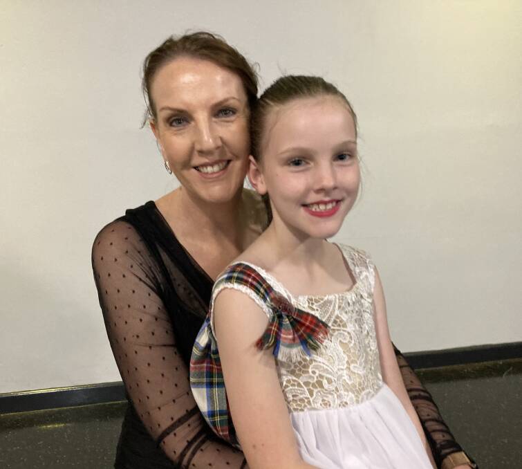 A FAMILY NIGHT: Matilda Watson, who held the responsibility of flower girl on the night, with her Mum Katrina Watson.