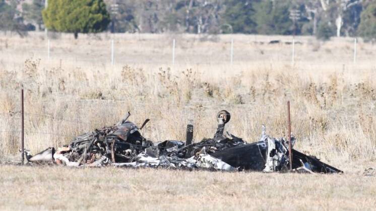 CRASH SITE: What was left of the plane, following the crash fire.