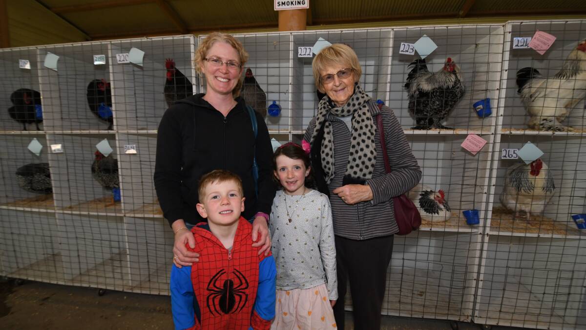 FAMILY FUN: Claire Kirby with her children, David (5) and Amelia(7) from Perthville and Jen Kirby( the kids' grandma, from Wangaratta).061018cpoultry4