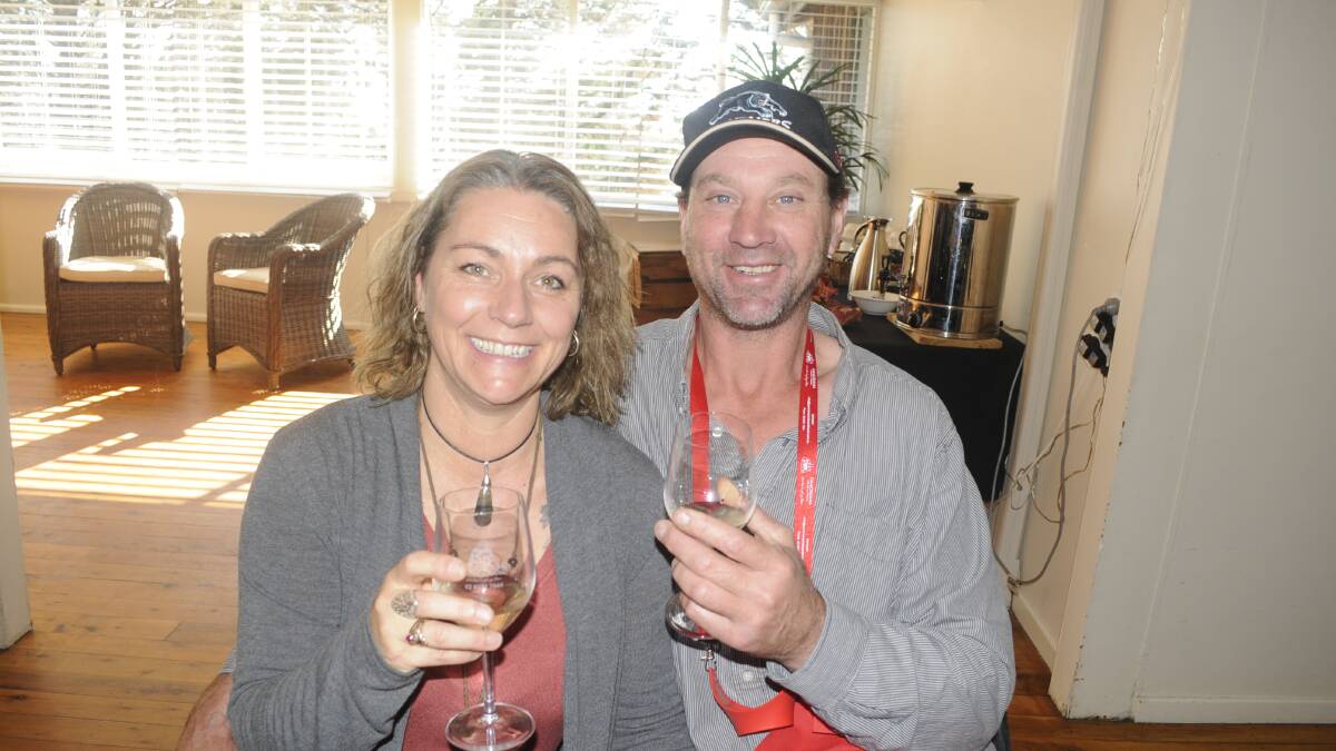 RAISING THEIR GLASSES: Renae Puckeridge and Simon Gorst enjoying the day. 061817cwinter5