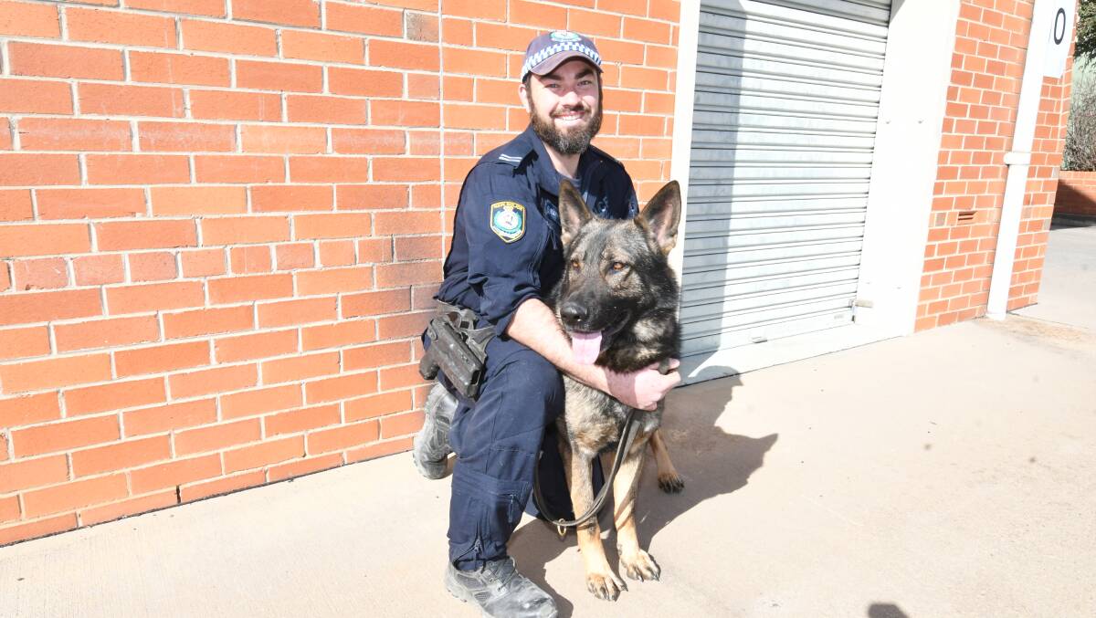 NEW DOG UNIT: Dog trainer, Sen Const Michael Elliott, with three-year-old Chaser, a general purpose police dog. Photo: Chris Seabrook 