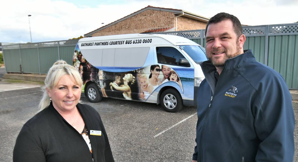 COMMUNITY: Bathurst Panthers duty manager Katrina Nelson and general manager John Fearnley with the new club bus. Photo: CHRIS SEABROOK 051121cpanbus