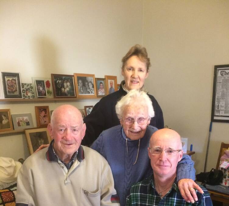 FAMILY CELEBRATION: Francie Morris with her family Kevin Reece, Joe Dowling and John Bullock at her birthday morning tea. 