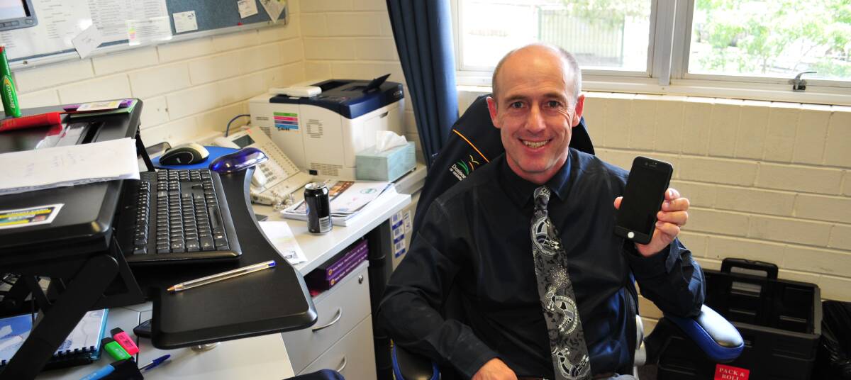 WORKING WELL: Principal of Bathurst High School, Ken Barwick, is happy the school's mobile phone procedure, of being off and put away in class, is working.