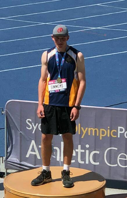 STATE CHAMPIONSHIP: Kane Simmons will represent his state in javelin in December after winning gold at the All Schools State Championships. Photo: CONTRIBUTED